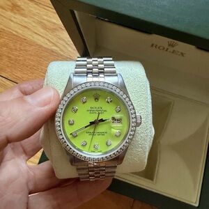 Rolex DateJust stainless steel watch with green face and 1.1 carats of diamonds